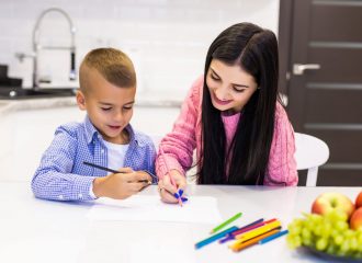 happy-mother-son-drawing-with-color-pencils-is-having-fun-home-min